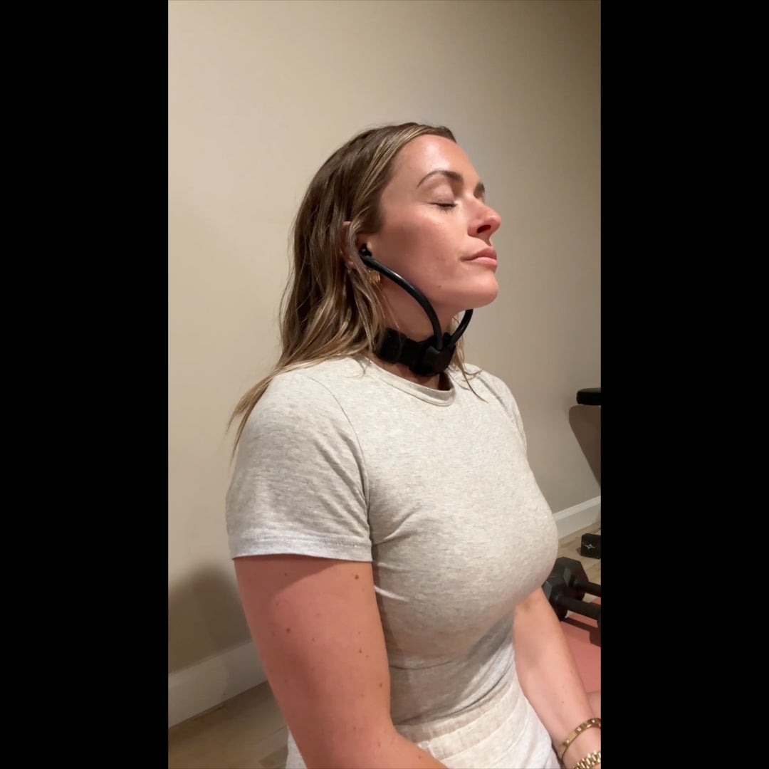 Woman wearing Inpulse with her eyes closed